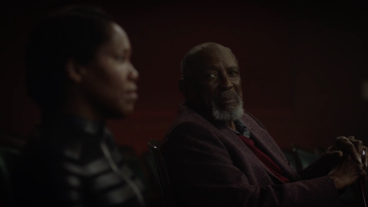 Will Reeves talks to his granddaughter in a theater