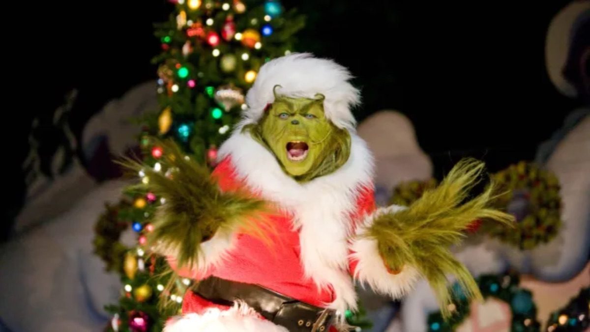the grinch at universal studios during grinchmas